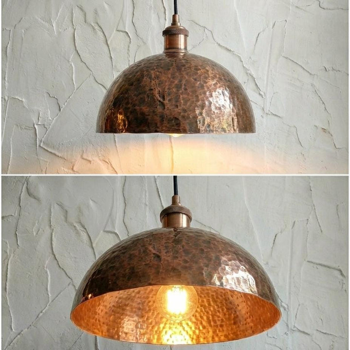 Copper pendant light fixture on a textured wall background